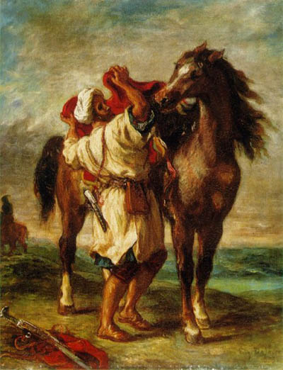 Марокканец, седлающий коня